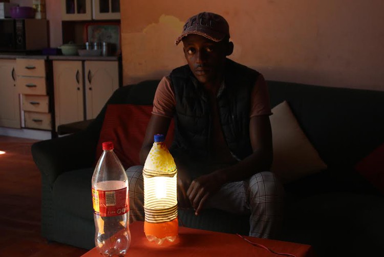 Cape man upcycles plastic bottles for study lamps