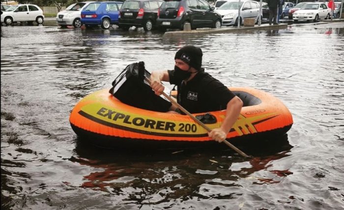 Cape Town man delivers pizza by paddle boat