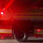 Strand coupled killed in fire, child escapes unharmed