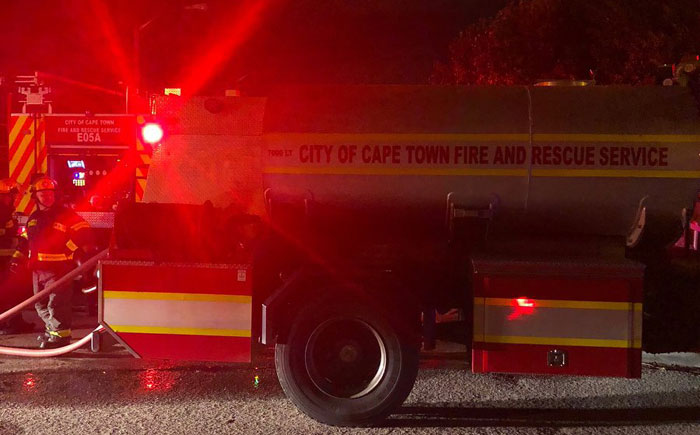 Strand coupled killed in fire, child escapes unharmed