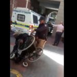 Two metro police suspended for throwing disabled man from wheelchair