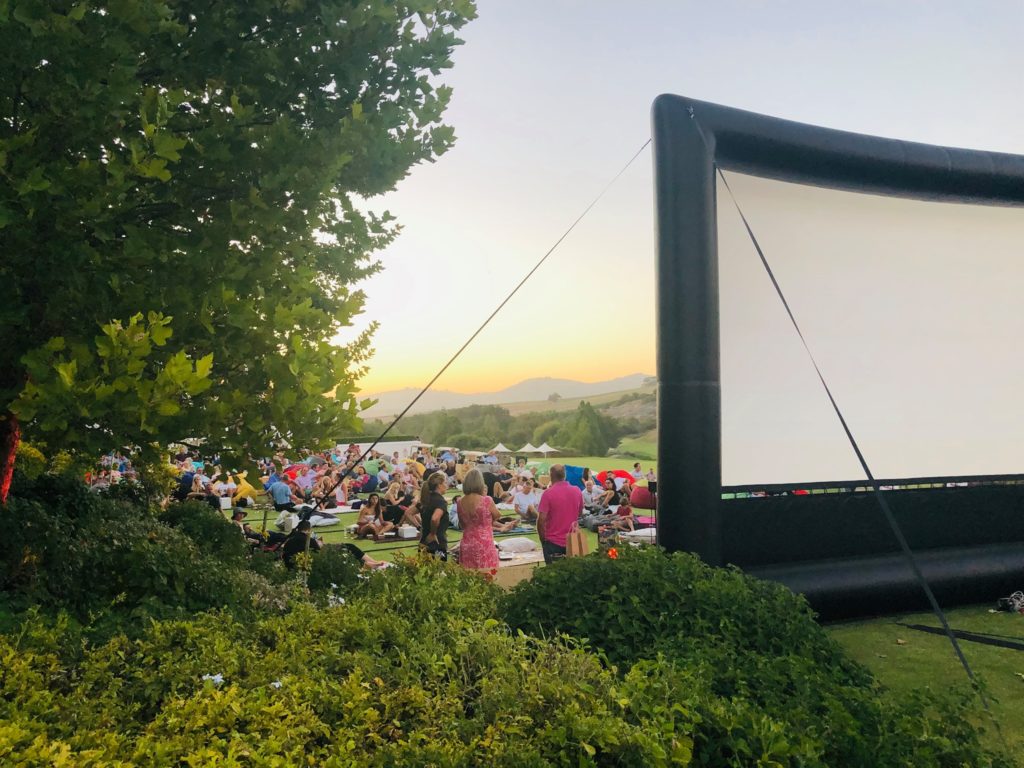 Enjoy an outdoor movie night on a Cape wine farm