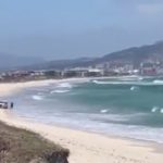 VIDEO: Police van stuck in the sand on Sunset Beach